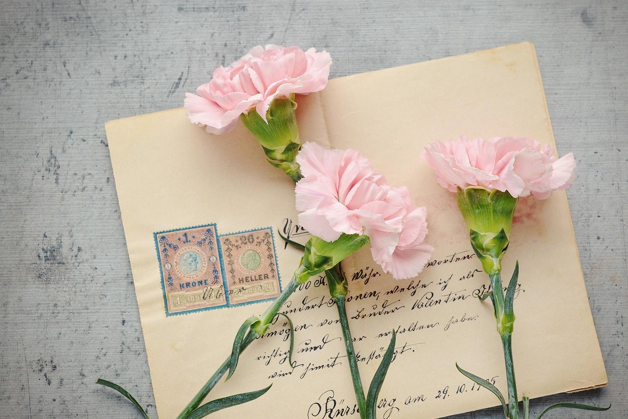 A stamped envelope ready to be mailed at a post office counter.